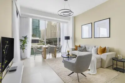 a living room with a couch and a table at GuestReady - Contemporary with Ain Dubai View in Dubai