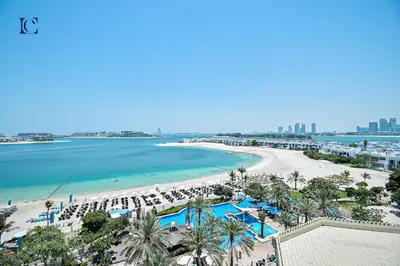 an aerial view of a beach and the ocean at Luxury Escapes - Palm Jumeirah's Spectacular Ocean-View Apartment - NABAT in Dubai