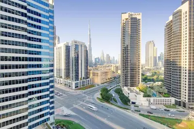 an aerial view of a city with tall buildings at Vacationer l Bright Studio l Burj Khalifa View l Business Bay in Dubai
