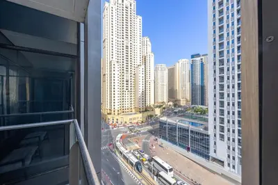 a view of a city street from a building at Vacationer I Sparkle T1 2 Bedroom I Marina Views I Steps away from Beach I Gym, Pool, Parking & Wi-Fi in Dubai
