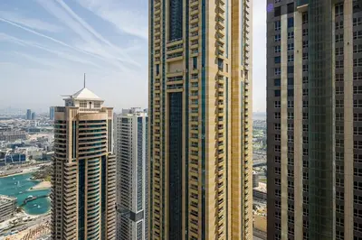 an aerial view of a city with tall buildings at Frank Porter - Elite Residence in Dubai