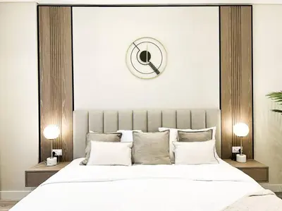 a bedroom with a large bed with white sheets and pillows at Upgraded Gorgeous 1BR at 5 Star Resort in Dubai