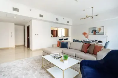 a living room with a couch and a table at Frank Porter - The Jwls T2 in Dubai
