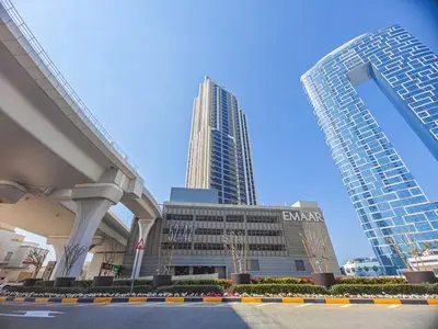 two tall buildings in a city with at Gorgeous 1 BR with Private Terrace - Marina View in Dubai