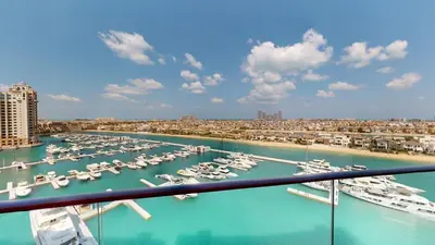 a view of a marina with boats in the water at 2 BD Tiara Palm Views, Beach & Pool, Amazing views of the Palm in Dubai