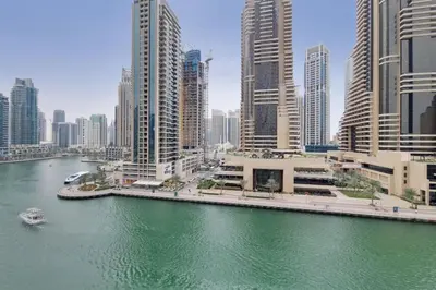 a view of a city with a river and buildings at Cayan Tower, Dubai Marina - Charming One Bedroom in Dubai