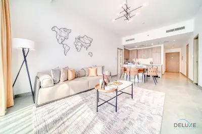 a living room with a couch and a table at Cosmopolitan 2BR at Stella Maris Dubai Marina by Deluxe Holiday Homes in Dubai