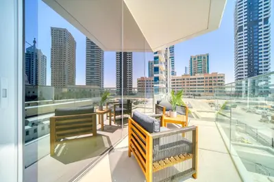 a balcony with a view of a city skyline at Spacious 1 Bed Apt - Stella Maris at Dubai Marina By PK Holidays in Dubai