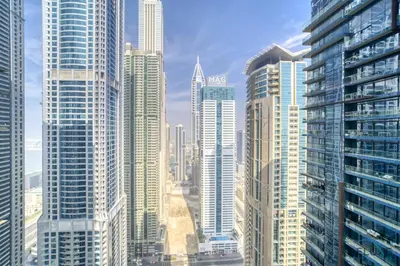 a view of a city with many tall buildings at Surreal 1BR at The Residence Marina Gate 2 Dubai Marina by Deluxe Holiday Homes in Dubai