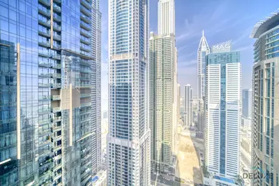 a view of a city with many tall buildings at Surreal 1BR at The Residence Marina Gate 2 Dubai Marina by Deluxe Holiday Homes in Dubai
