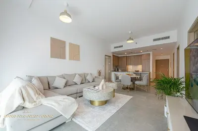 a living room with a couch and a table at Marco Polo - Wake up to stunning sea views at Stella Maris in Dubai