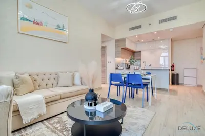 a living room with a couch and a table at Peaceful 1BR in Studio One Dubai Marina by Deluxe Holiday Homes in Dubai