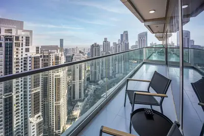 a balcony with a view of a city at Luxury 3 bedroom apartment in Paramount Midtown in Dubai