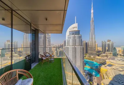 a balcony with a view of the city at EDEN'S Homes & Villas - Boulevard Point in Dubai