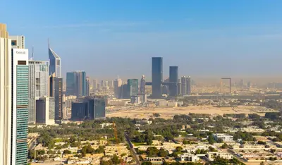 an aerial view of a city with tall buildings at EDEN'S Homes & Villas - Boulevard Point in Dubai