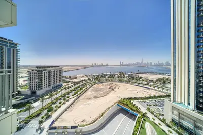 a view of a beach in a city with buildings at Captivating 1BR at 17 Icon Bay Dubai Creek Harbour by Deluxe Holiday Homes in Dubai