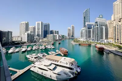 a group of boats docked in a harbor in a city at Luxury Residence Stella Maris in Dubai