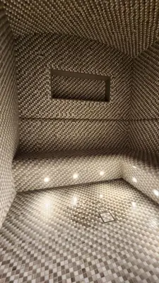 a bathroom with a shower with a tiled floor at STAY La Casa Da Vinci 1BR Holiday Home CVR B3002 near Burj Khalifa in Dubai