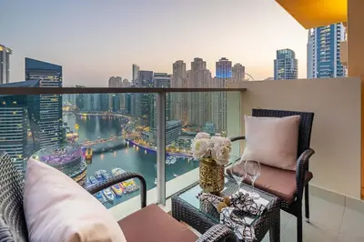 a balcony with a view of a city skyline at Frank Porter - Emaar Residences Dubai Marina in Dubai