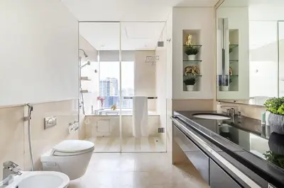 a bathroom with a toilet and a sink at Frank Porter - Emaar Residences Dubai Marina in Dubai