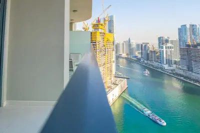 a view of a river from a building at EasyGo - Affordable 1br Close to Public Transit - Zad-13 in Dubai