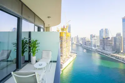a view of a river from a building at EasyGo - Affordable 1br Close to Public Transit - Zad-13 in Dubai