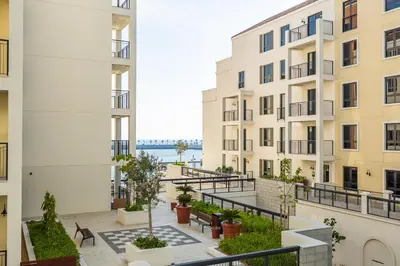 a view from the balcony of an apartment building at Apartment with Partial Sea View in La Mer in Dubai