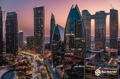 a cityscape of a city with tall buildings at Suitestay Address Dubai Mall Residence in Dubai