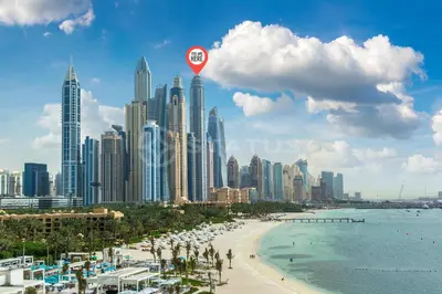 a view of a city with a beach and buildings at Birds Eye 2BR - Torch Tower-L51 - Near Marina Walk in Dubai