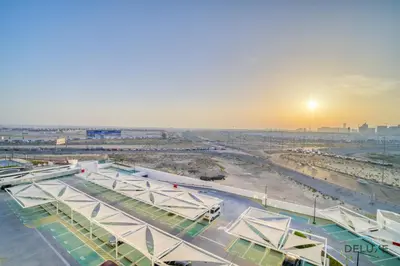 an aerial view of a soccer stadium at sunset at Picturesque Studio at Carson A DAMAC Hills Dubailand by Deluxe Holiday Homes in Dubai
