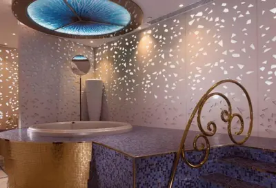 a bathroom with a round sink and a mirror at StoneTree - DAMAC Heights 1 BR - Amazing Facilities in Dubai
