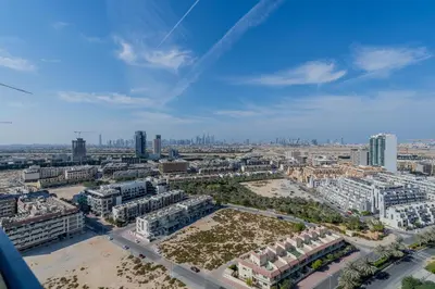 an aerial view of a city with tall buildings at Marina & Downtown Views in Modern Studio - JVC in Dubai