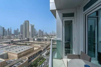 a balcony with a view of a city at New Listing - Serviced Apartment & TOP Amenities in Dubai